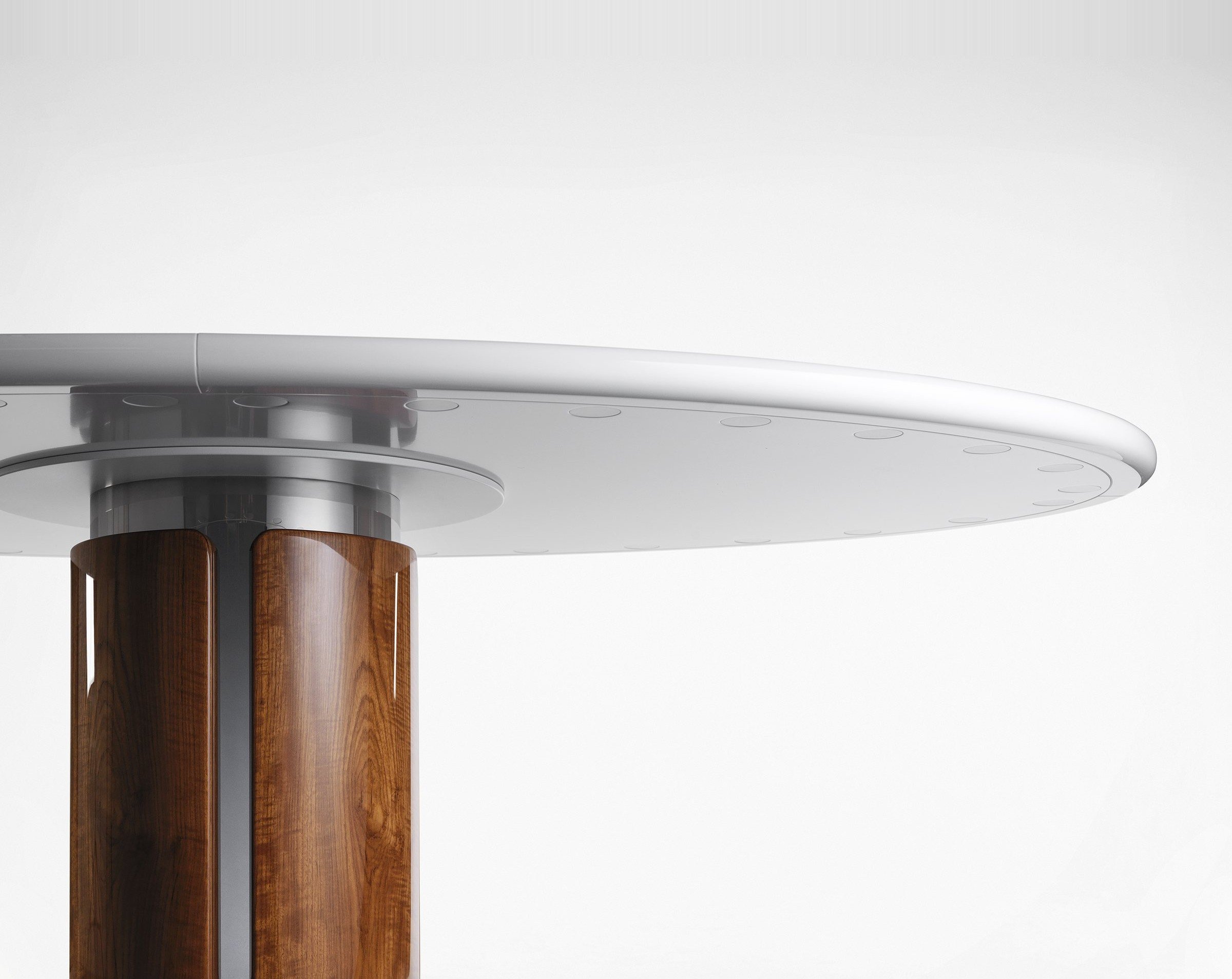 Detail of the chrome and walnut pedestal base