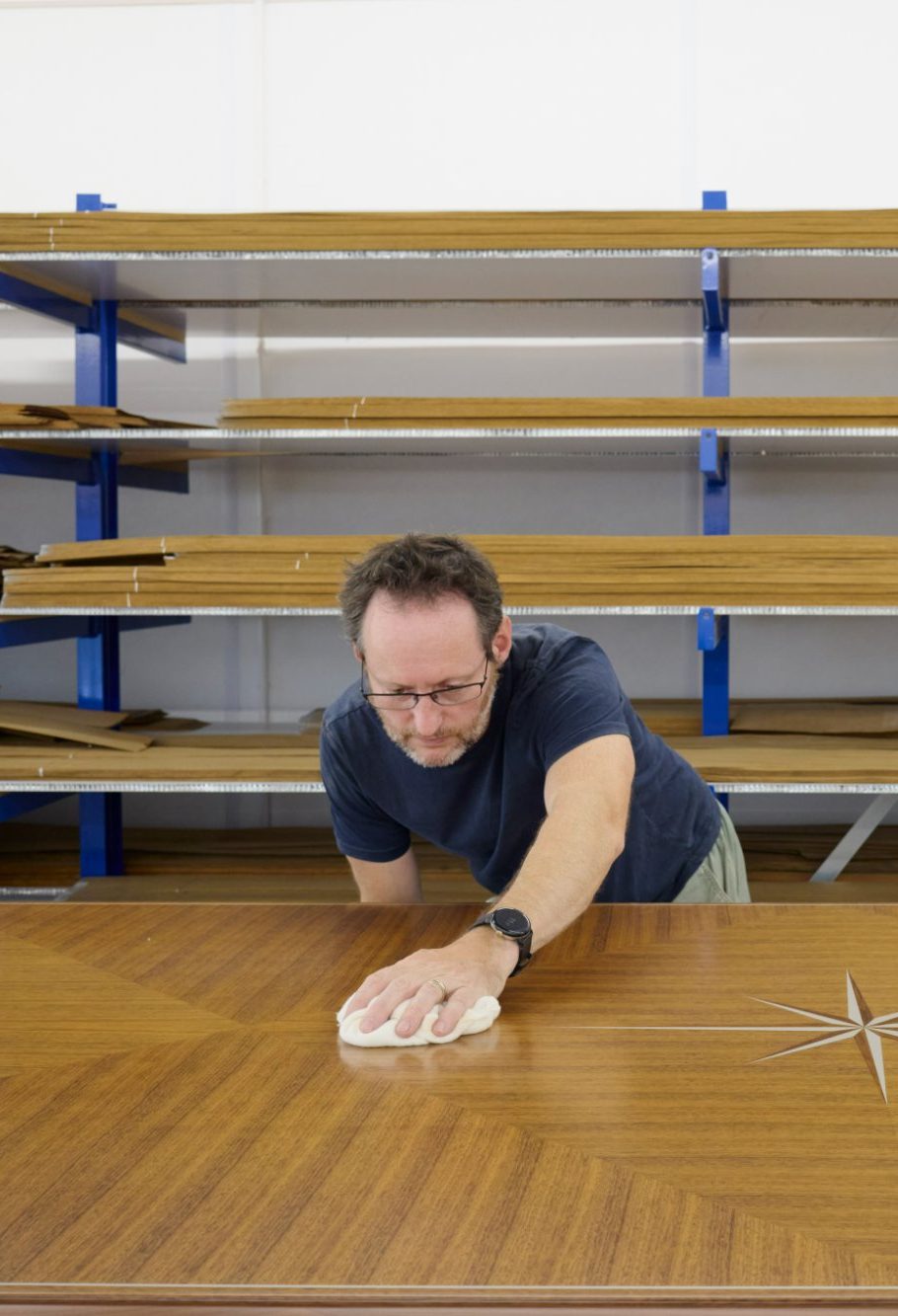 Polishing a finished table top with a star inlay